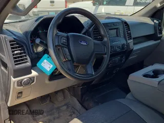 2018 Ford F-150 XL with VIN 1FTMF1EB9JKD38518, listed as a IAAI auction lot 42730627 with 205,804 mi miles and . Bid and sale history available at DreamBid. Image 9.