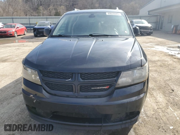 2018 Dodge Journey SE with VIN 3C4PDCABXJT242593, listed as a Copart auction lot 49830085 with 176,553 mi miles and Salvage Title. Bid and sale history available at carsss.com. Image 5.