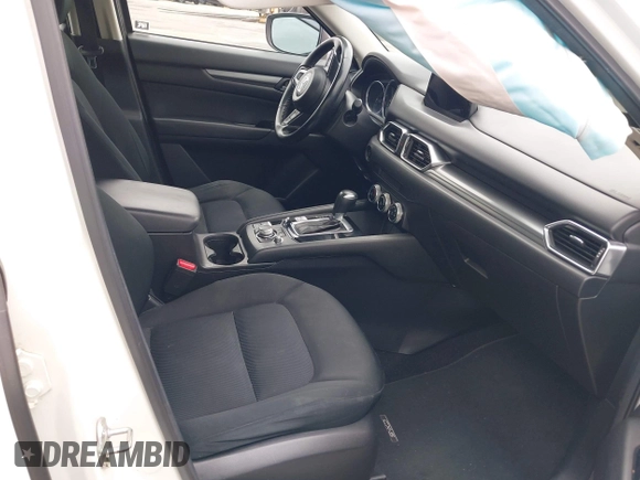 2019 Mazda CX-5 Sport with VIN JM3KFABM4K1565787, listed as a IAAI auction lot 42054585 with 80,580 mi miles and . Bid and sale history available at DreamBid. Image 5.