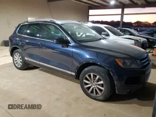 2012 Volkswagen Touareg Exec with VIN WVGEF9BP8CD007760, listed as a Copart auction lot 79271654 with 164,287 mi miles and Clean Title. Bid and sale history available at DreamBid. Image 4.