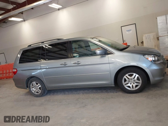 2007 Honda Odyssey EX-L with VIN 5FNRL38737B095747, listed as a IAAI auction lot 42126000 with 178,779 mi miles. Bid and sale history available at carsss.com. Image 13.