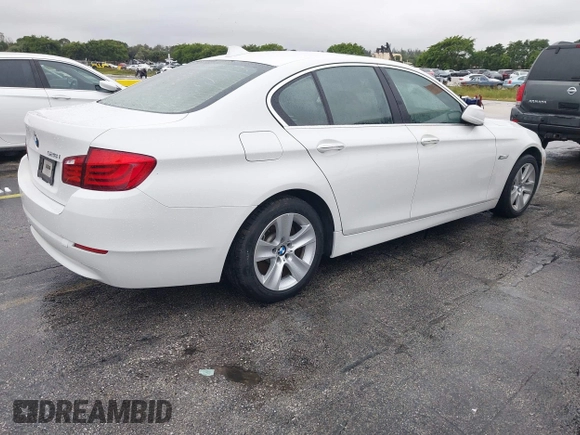 2012 BMW 5 Series 528i with VIN WBAXG5C55CDW85766, listed as a IAAI auction lot 41373727 with 105,056 mi miles. Bid and sale history available at carsss.com. Image 4.