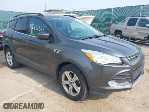 2016 Ford Escape SE z VIN 1FMCU0GX1GUC56439, wystawiony jako IAAI lot #42491397 z przebiegiem 158 785 mil mil oraz . Historia ofert i sprzedaży dostępna na DreamBid. Obrazek 1.