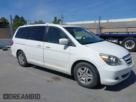 2005 Honda Odyssey EX-L with VIN 5FNRL38605B045246, listed as a IAAI auction lot 42183883 with 164,072 mi miles and . Bid and sale history available at carsss.com. Image 1.