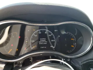 2019 Jeep Grand Cherokee Trailhawk with VIN 1C4RJFLG6KC838275, listed as a Copart auction lot 53002185 with 77,597 mi miles and Salvage title. Bid and sale history available at DreamBid. Image 9.