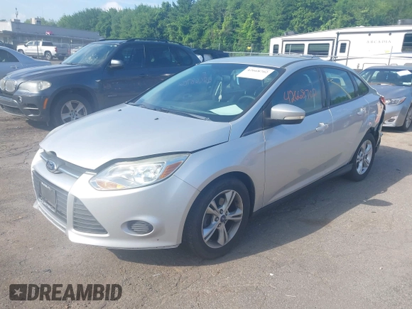 2013 Ford Focus SE with VIN 1FADP3F26DL249436, listed as a IAAI auction lot 42668702 with 79,182 mi miles and . Bid and sale history available at DreamBid. Image 2.