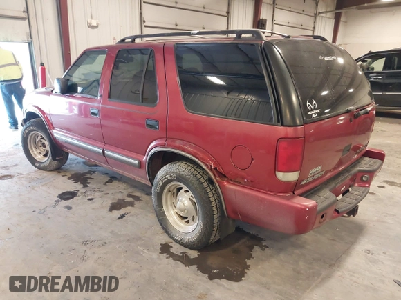 2000 Chevrolet Blazer LT z VIN 1GNDT13W1Y2358746, wystawiony jako IAAI lot #41541071 z przebiegiem 205 532 mil mil oraz . Historia ofert i sprzedaży dostępna na DreamBid. Obrazek 3.