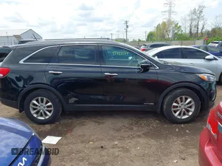 2016 Kia Sorento LX with VIN 5XYPGDA5XGG168325, listed as a IAAI auction lot 42123471 with 267,254 mi miles. Bid and sale history available at carsss.com. Image 13.