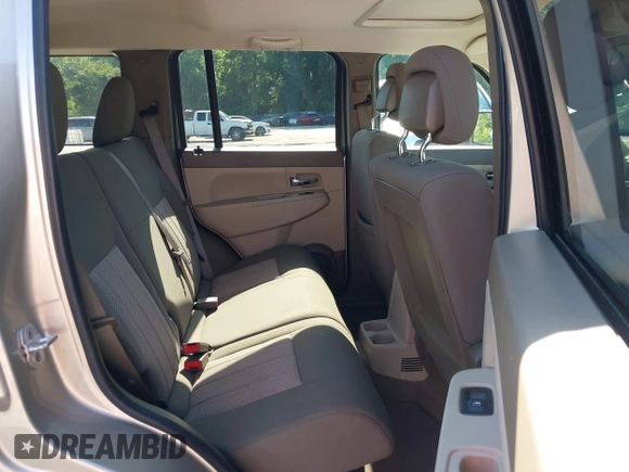 2011 Jeep Liberty Sport with VIN 1J4PN2GKXBW588535, listed as a IAAI auction lot 42546904 with 155,743 mi miles and . Bid and sale history available at DreamBid. Image 8.