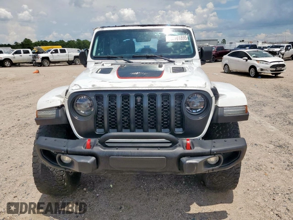 2021 Jeep Wrangler Unlimited Rubicon with VIN 1C4JJXFG1MW849460, listed as a Copart auction lot 62701895 with 54,517 mi miles and Salvage title. Bid and sale history available at DreamBid. Image 5.