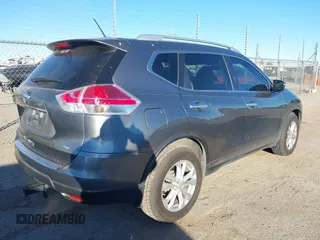 2015 Nissan Rogue SV with VIN KNMAT2MT1FP583514, listed as a IAAI auction lot 41389269 with 128,016 mi miles. Bid and sale history available at carsss.com. Image 4.