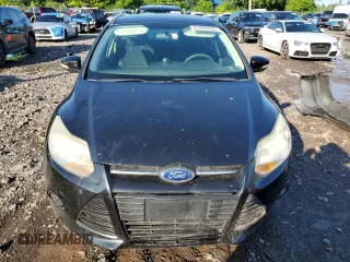 2013 Ford Focus SE z VIN 1FADP3F27DL369634, wystawiony jako Copart lot #61409725 z przebiegiem 122 709 mil mil oraz Szkoda całkowita • Salvage title. Historia ofert i sprzedaży dostępna na DreamBid. Obrazek 5.