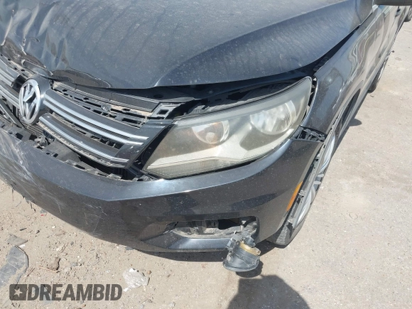 2012 Volkswagen Tiguan SE with VIN WVGAV7AX6CW521960, listed as a IAAI auction lot 42249355 with 118,496 mi miles and . Bid and sale history available at DreamBid. Image 6.
