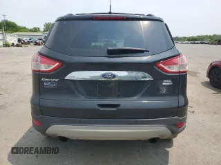2013 Ford Escape SEL z VIN 1FMCU9H94DUD47723, wystawiony jako Copart lot #59765595 z przebiegiem 129 551 mil mil oraz Szkoda całkowita • Salvage title. Historia ofert i sprzedaży dostępna na DreamBid. Obrazek 6.