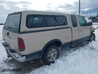 1998 Ford F-150 Standard with VIN 1FTZX18W5WKB97701, listed as a IAAI auction lot 41254873 with 291,523 mi miles. Bid and sale history available at carsss.com. Image 4.