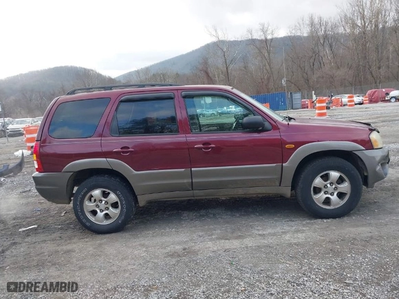 2003 Mazda Tribute ES with VIN 4F2CZ96103KM01371, listed as a IAAI auction lot 41379492 with 196,083 mi miles. Bid and sale history available at carsss.com. Image 14.