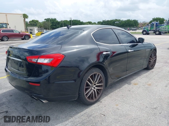2015 Maserati Ghibli with VIN ZAM57XSA1F1144073, listed as a IAAI auction lot 42770723 with 105,782 mi miles and . Bid and sale history available at DreamBid. Image 4.