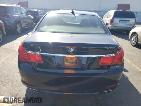 2011 BMW 7 Series 750Li with VIN WBAKB8C52BCY66628, listed as a Copart auction lot 77191054 with 39,503 mi miles and Salvage title. Bid and sale history available at DreamBid. Image 6.