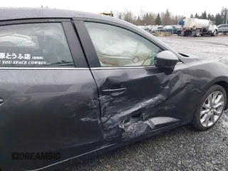 2016 Mazda 3 S Grand Touring z VIN JM1BM1N37G1351062, wystawiony jako IAAI lot #41573775 z przebiegiem 68 634 mil mil oraz . Historia ofert i sprzedaży dostępna na DreamBid. Obrazek 6.
