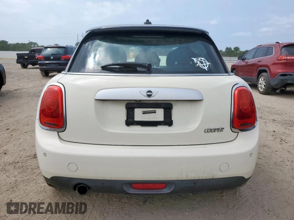 2015 MINI Hardtop 4 Door with VIN WMWXS5C51FT831167, listed as a Copart auction lot 52778685 with 52,770 mi miles and Salvage title. Bid and sale history available at DreamBid. Image 6.