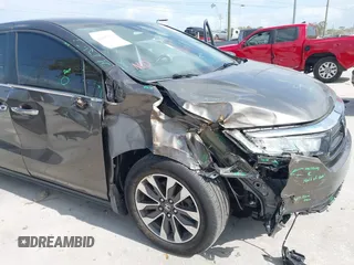 2022 Honda Odyssey EX-L with VIN 5FNRL6H77NB031502, listed as a IAAI auction lot 41706098 with 57,074 mi miles and . Bid and sale history available at DreamBid. Image 6.
