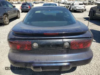 2000 Pontiac Firebird Firebird z VIN 2G2FS22K1Y2160613, wystawiony jako Copart lot #68363214 z przebiegiem 211 139 mil mil oraz Tytuł czysty. Historia ofert i sprzedaży dostępna na DreamBid. Obrazek 6.
