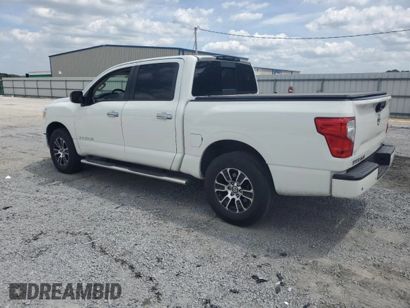 2021 Nissan Titan SV with VIN 1N6AA1ECXMN528984, listed as a Copart auction lot 53950365 with 64,474 mi miles and Salvage title. Bid and sale history available at DreamBid. Image 2.
