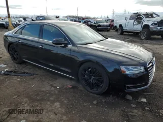 2015 Audi A8 L 4.0T with VIN WAU32AFD3FN036507, listed as a Copart auction lot 49121635 with 77,257 mi miles and Salvage Title. Bid and sale history available at carsss.com. Image 4.