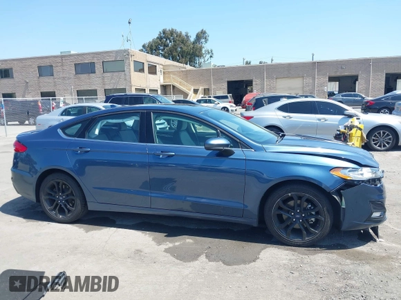 2019 Ford Fusion SE with VIN 3FA6P0HD6KR177660, listed as a IAAI auction lot 42164831 with 66,585 mi miles and . Bid and sale history available at DreamBid. Image 14.
