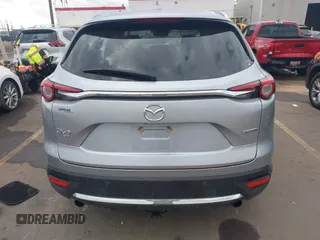2021 Mazda CX-9 Grand Touring with VIN JM3TCBDY8M0515065, listed as a IAAI auction lot 41359765 with 80,221 mi miles and . Bid and sale history available at carsss.com. Image 17.