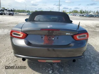 2017 FIAT 124 Spider Lusso z VIN JC1NFAEK7H0123436, wystawiony jako Copart lot #56169965 z przebiegiem 133 320 mil mil oraz Czysty tytuł • Clean title. Historia ofert i sprzedaży dostępna na DreamBid. Obrazek 6.