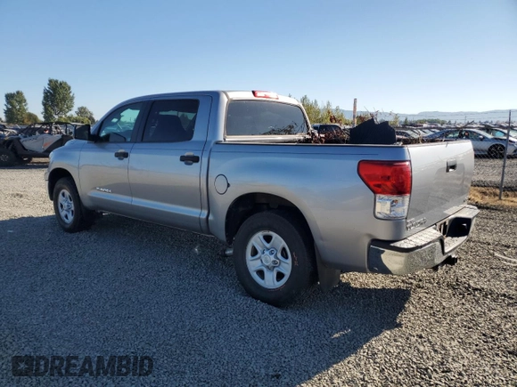 2012 Toyota Tundra 4WD Truck with VIN 5TFDM5F14CX035946, listed as a Copart auction lot 69534764 with 33,668 mi miles and Salvage Title. Bid and sale history available at carsss.com. Image 2.