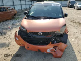 2016 Smart fortwo Passion с VIN WMEFJ5DA7GK066701, выставлен на аукционе Copart как лот 59093055 с пробегом 84 417 миль миль и Списание • Salvage title. История ставок и продаж доступна на DreamBid. Изображение 5.