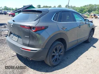 2024 Mazda CX-30 S Select Sport with VIN 3MVDMBBM9RM641576, listed as a IAAI auction lot 42541454 with 40,271 mi miles and . Bid and sale history available at DreamBid. Image 4.