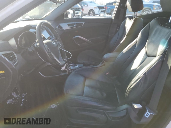 2014 Hyundai Veloster with VIN KMHTC6AD7EU213774, listed as a Copart auction lot 88239215 with 135,631 mi miles and Salvage Title. Bid and sale history available at carsss.com. Image 7.