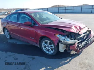 2018 Ford Fusion SE z VIN 3FA6P0LU0JR208794, wystawiony jako IAAI lot #41904554 z przebiegiem 168 255 mil mil oraz . Historia ofert i sprzedaży dostępna na DreamBid. Obrazek 1.