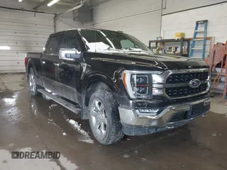 2021 Ford F-150 XL with VIN 1FTFW1E8XMFA47553, listed as a IAAI auction lot 41496255 with 83,711 mi miles. Bid and sale history available at carsss.com. Image 1.