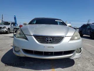 2006 Toyota Solara SE z VIN 4T1FA38P66U095722, wystawiony jako Copart lot #56789975 z przebiegiem 181 612 mil mil oraz Tytuł czysty. Historia ofert i sprzedaży dostępna na DreamBid. Obrazek 5.