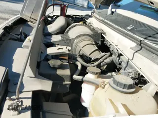 2010 Ford Econoline Cargo Commercial with VIN 1FTNE2EW1ADA99714, listed as a IAAI auction lot 40697600 with 99,977 mi miles and . Bid and sale history available at DreamBid. Image 18.