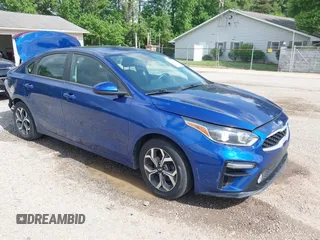 2019 Kia Forte LXS z VIN 3KPF24AD0KE135616, wystawiony jako IAAI lot #42277938 z przebiegiem 71 995 mil mil oraz . Historia ofert i sprzedaży dostępna na DreamBid. Obrazek 1.