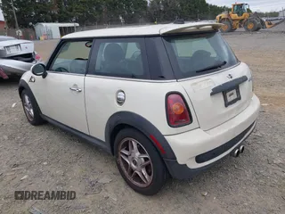 2007 MINI Hardtop S with VIN WMWMF73527TL89861, listed as a IAAI auction lot 41953013 with 111,222 mi miles and . Bid and sale history available at DreamBid. Image 3.