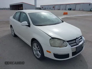 2008 Volkswagen Jetta Sedan S with VIN 3VWJZ71K58M075639, listed as a IAAI auction lot 41855222 with 142,902 mi miles. Bid and sale history available at carsss.com. Image 13.