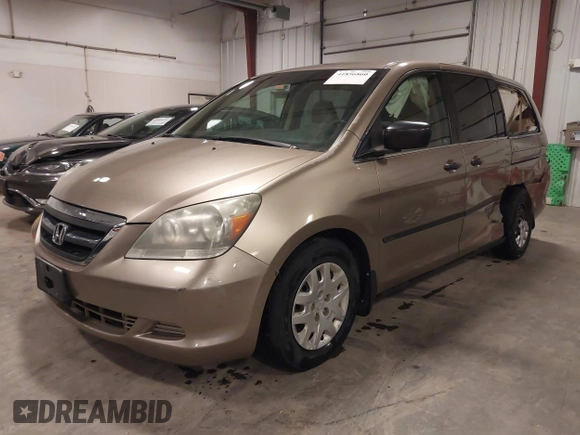2006 Honda Odyssey LX with VIN 5FNRL38256B113667, listed as a IAAI auction lot 41856860 with 142,031 mi miles. Bid and sale history available at carsss.com. Image 2.