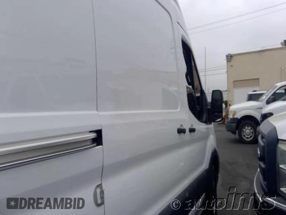 2020 Ford Transit Cargo z VIN 1FTBW3X87LKB80879, wystawiony jako IAAI lot #42546000 z przebiegiem 104 720 mil mil oraz . Historia ofert i sprzedaży dostępna na DreamBid. Obrazek 7.