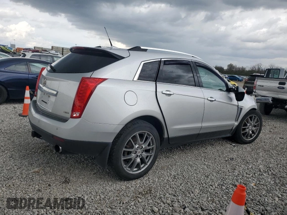 2013 Cadillac SRX Performance Collection z VIN 3GYFNHE3XDS622157, wystawiony jako Copart lot #53475675 z przebiegiem 95 253 mil mil oraz Szkoda całkowita • Salvage title. Historia ofert i sprzedaży dostępna na DreamBid. Obrazek 3.