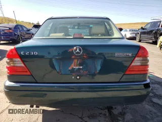 1997 Mercedes-Benz C with VIN WDBHA23EXVF507185, listed as a Copart auction lot 73716364 with 167,171 mi miles and Salvage title. Bid and sale history available at DreamBid. Image 6.