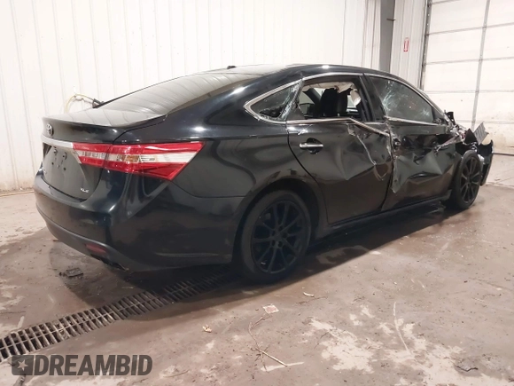 2014 Toyota Avalon Limited with VIN 4T1BK1EBXEU119284, listed as a IAAI auction lot 41161814 with 222,497 mi miles. Bid and sale history available at carsss.com. Image 4.