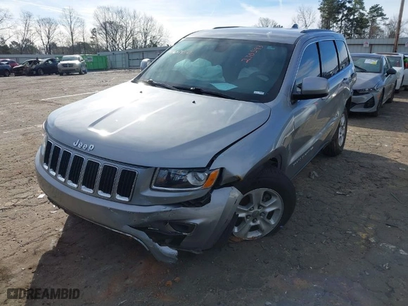 2014 Jeep Grand Cherokee Laredo with VIN 1C4RJFAG7EC270593, listed as a IAAI auction lot 41609865 with 184,145 mi miles. Bid and sale history available at carsss.com. Image 2.