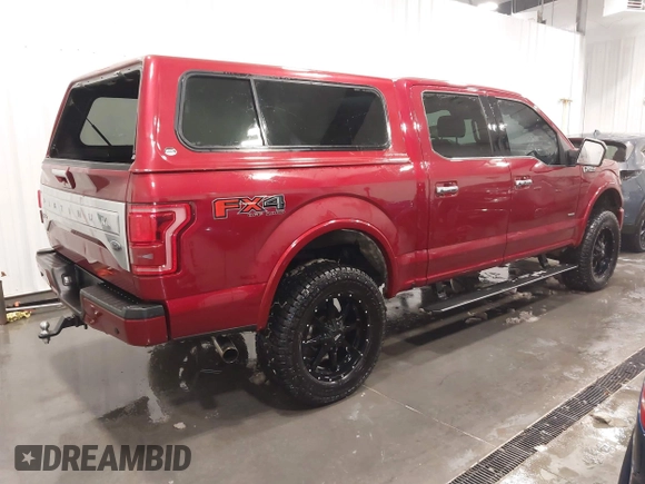 2015 Ford F-150 XLT with VIN 1FTEW1EG5FFB90898, listed as a IAAI auction lot 41617424 with 128,587 mi miles. Bid and sale history available at carsss.com. Image 4.