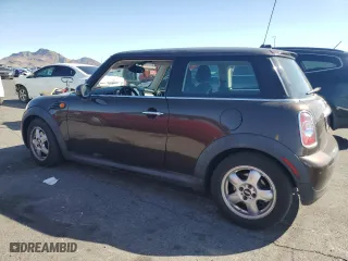 2011 MINI Cooper Hardtop with VIN WMWSU3C55BT094204, listed as a Copart auction lot 53994195 with 132,938 mi miles and Clean Title. Bid and sale history available at carsss.com. Image 2.